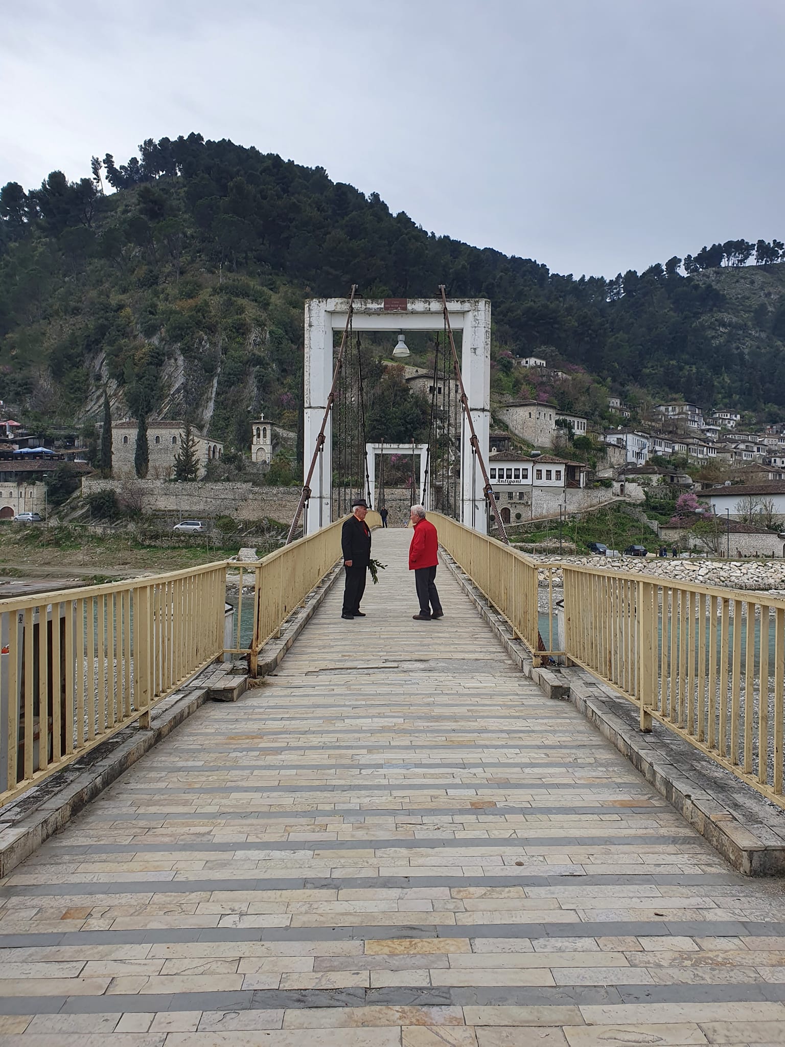 May be an image of 2 people and Stari Most